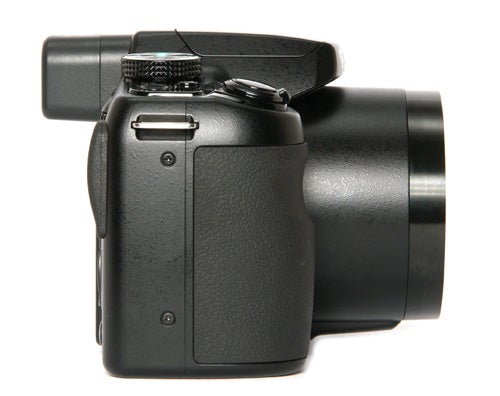 Pentax X70 digital camera on a white background.