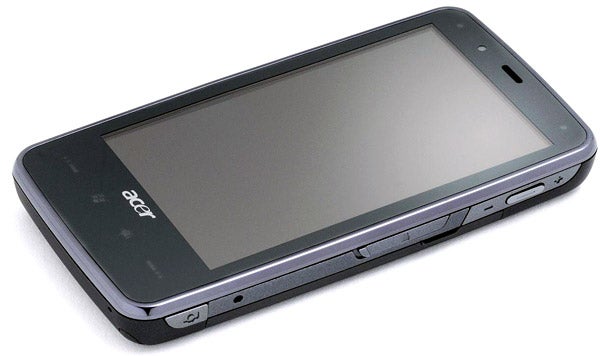 Acer Tempo F900 smartphone lying on a flat surface.