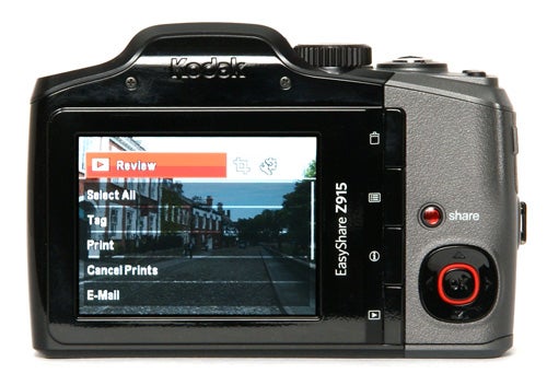 Kodak EasyShare Z915 camera displaying photo review screen.