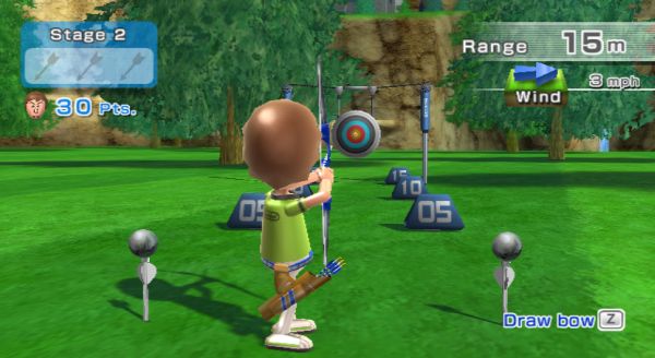 Wii Sports Resort archery gameplay on a virtual green field.