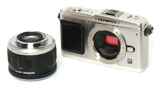 Olympus Pen E-P1 camera with detached lens.