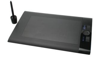Wacom Intuos 4 Graphics Tablet with stylus on white background.