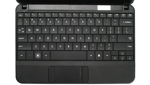 HP Compaq Mini 110c netbook keyboard and touchpad close-up.