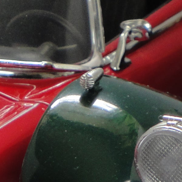 Close-up photo of a red toy car captured by Sony camera