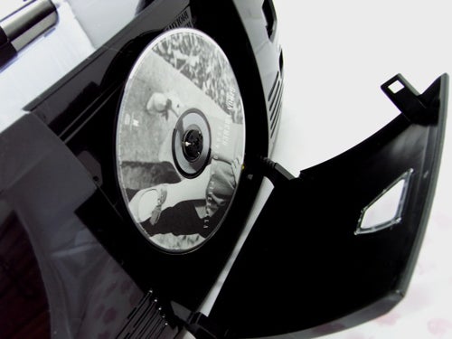 Close-up of Gear4 CDB-50 iPod/CD Speaker System with open CD compartment.