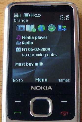 Nokia 6700 Classic phone displaying home screen.