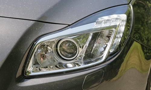 Close-up of Vauxhall Insignia Elite headlight and part of grille.
