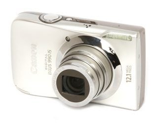 Canon IXUS 990 IS digital camera on white background.
