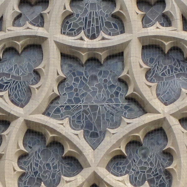 Close-up photo of architectural stone carvings.