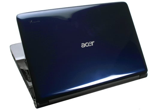 Acer Aspire 7735Z laptop with glossy blue cover.