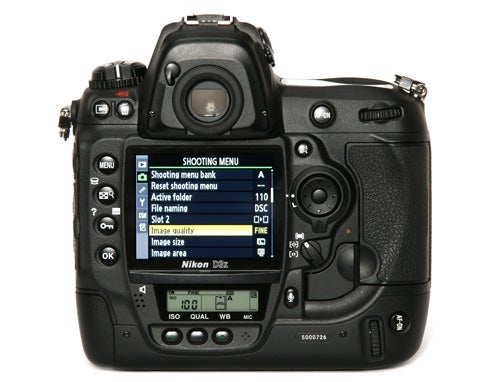 Nikon D3x DSLR camera with shooting menu on LCD display.