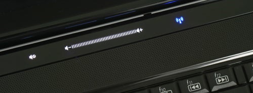 Close-up of HP Pavilion dv6 laptop's volume control and power button.