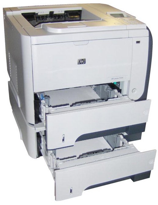 HP LaserJet P3015X printer with open paper trays.