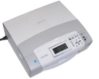 Brother DCP-385C inkjet printer on a white background.