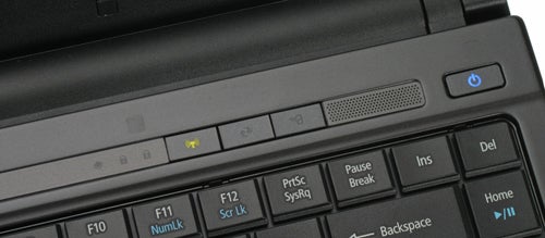Close-up of Acer TravelMate 8371 laptop keyboard and power button.
