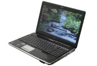 HP Pavilion dv6-1210sa laptop with screen displaying wallpaper.