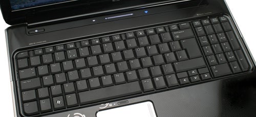 HP Pavilion dv6 laptop keyboard and touchpad close-up.
