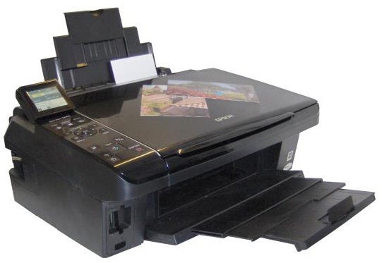 Epson Stylus SX415 all-in-one inkjet printer with output tray open.