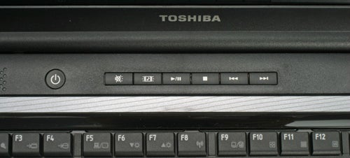 Close-up of Toshiba Satellite L300 laptop's media control keys.