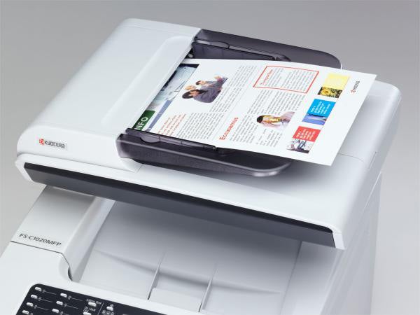 Kyocera Mita FS-C1020MFP printer with a printed document.