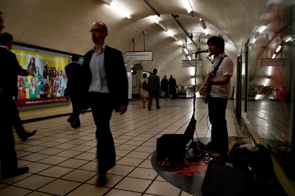 Subway station scene captured with Pentax K-7 camera.