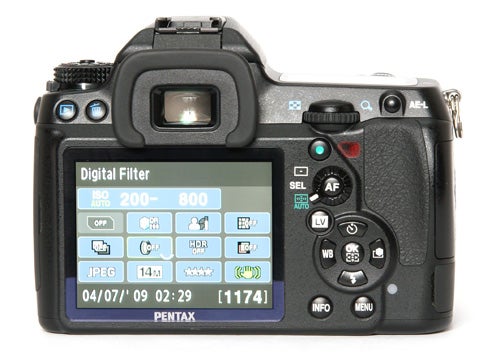 Pentax K-7 DSLR camera displaying menu settings on screen.