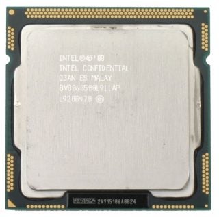 Intel Core i7 processor with markings on silver surface.