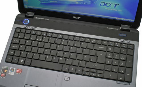 Acer Aspire 5536 laptop with keyboard and screen visible.