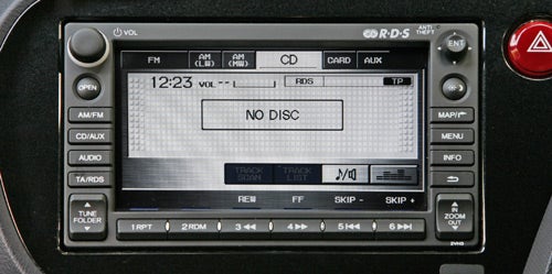 Honda Insight's dashboard stereo system displaying 