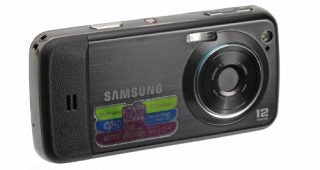 Samsung M8910 Pixon 12 camera phone on white background.