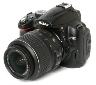 Nikon D5000 Digital SLR camera with zoom lens.