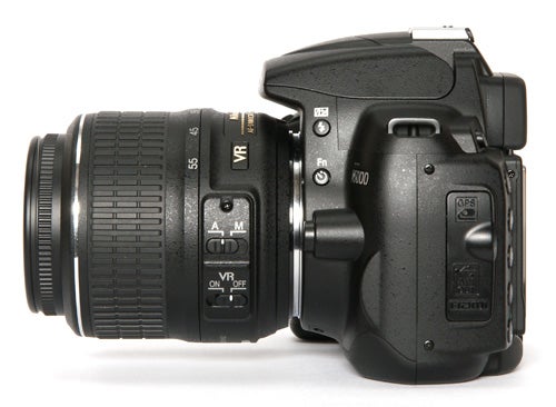 Nikon D5000 DSLR camera with zoom lens.