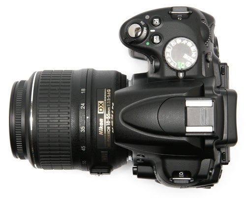 Nikon D5000 DSLR camera with zoom lens from above.