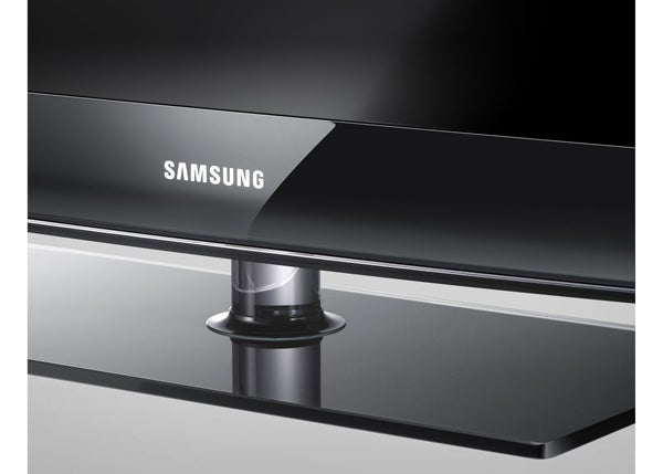 Close-up of Samsung 32-inch LCD TV stand and logo.