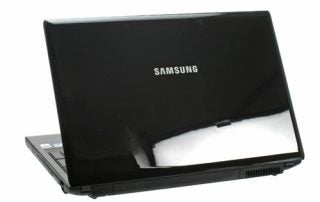 Samsung R620 laptop with black glossy lid and logo.