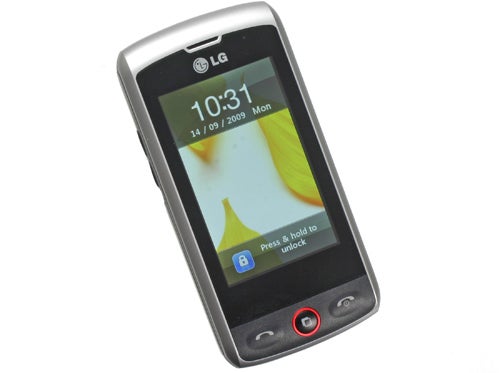 LG GW520 mobile phone showing time and unlock prompt.