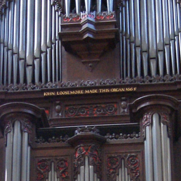Historic pipe organ with inscription 