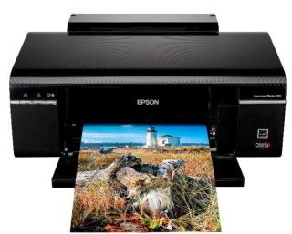 Epson Stylus Photo P50 printer with a colorful landscape printout.
