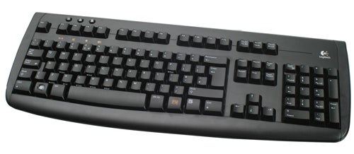 Black Logitech computer keyboard on white background.