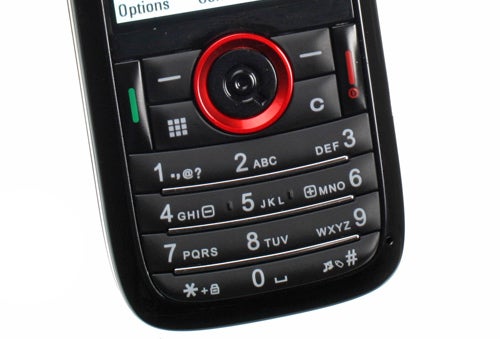 Close-up of INQ Mini 3G mobile phone keypad and screen.