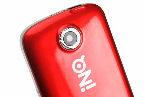 Close-up of INQ Mini 3G's red back with camera lens.
