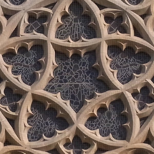 Intricate stone lattice pattern with a background.