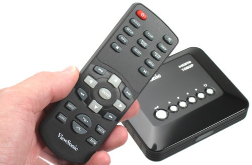 ViewSonic VMP30 media player and remote held in hand