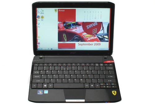 Acer Ferrari One 11.6-inch netbook with Ferrari-themed wallpaper.