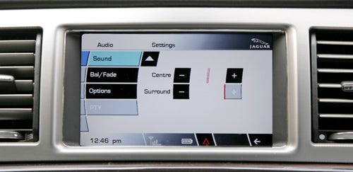 Jaguar XF infotainment system screen showing audio settings.