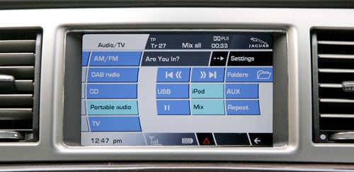 Jaguar XF infotainment system display showing audio options.