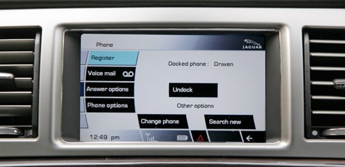 Jaguar XF infotainment screen displaying phone connectivity options.