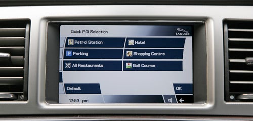 Jaguar XF touchscreen with navigation menu options.