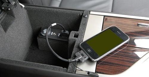 Smartphone connected to Jaguar XF's in-car entertainment system.