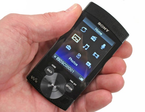 Hand holding Sony Walkman NWZ-S544 8GB media player.